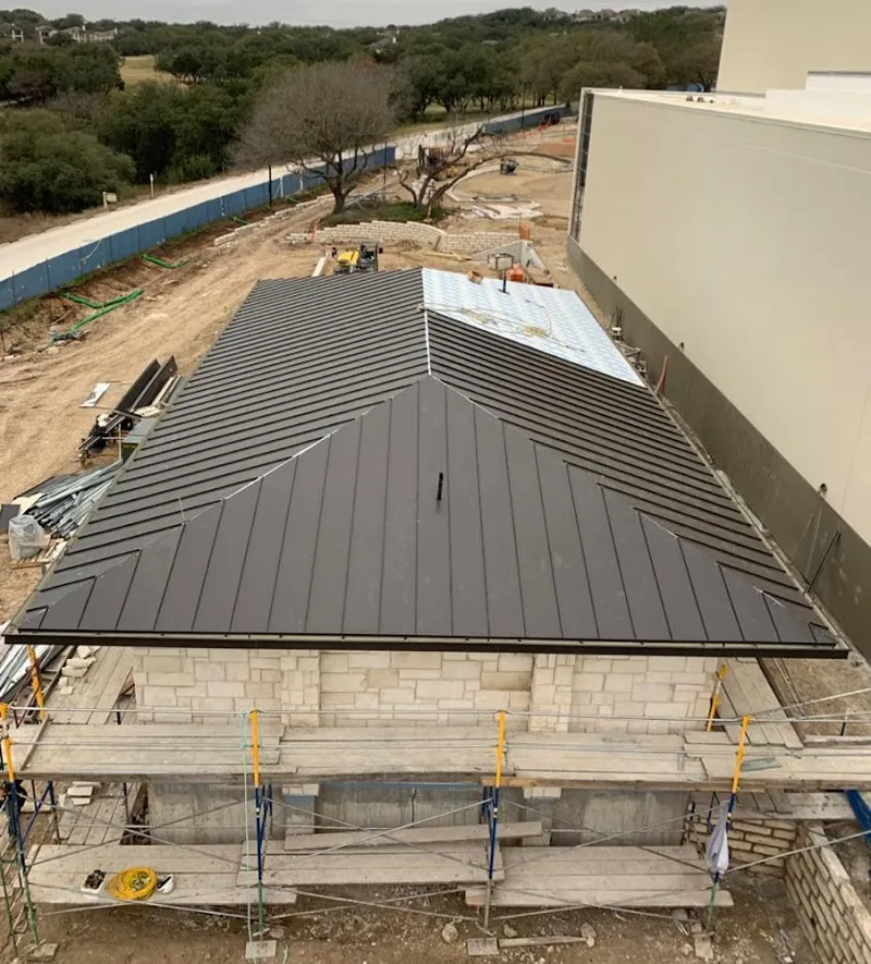 Metal roof new construction with scaffolding in Dover